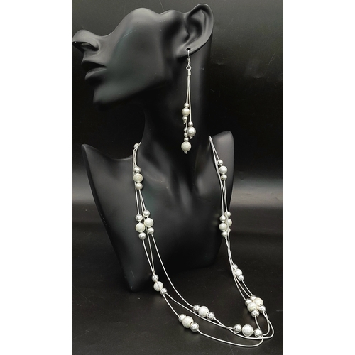 508 - An Italian Sterling Silver Set of Necklace, Bracelet and Pair of Drop Earrings. Bauble decoration th... 