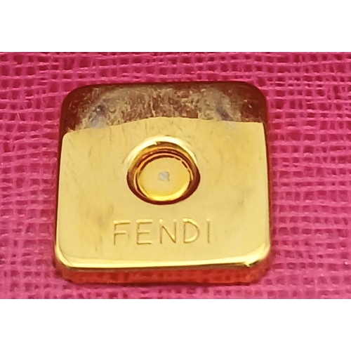 542 - A Fendi Pink Leather Shoulder Bag. Pink leather exterior with gold-tone logo hardware, detachable sh... 