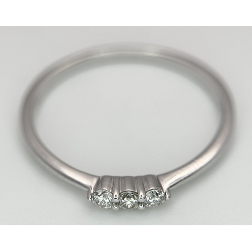 558 - AN 18K WHITE GOLD, DIAMOND 3 STONE RING. 1.3G, SIZE N. SC 4048