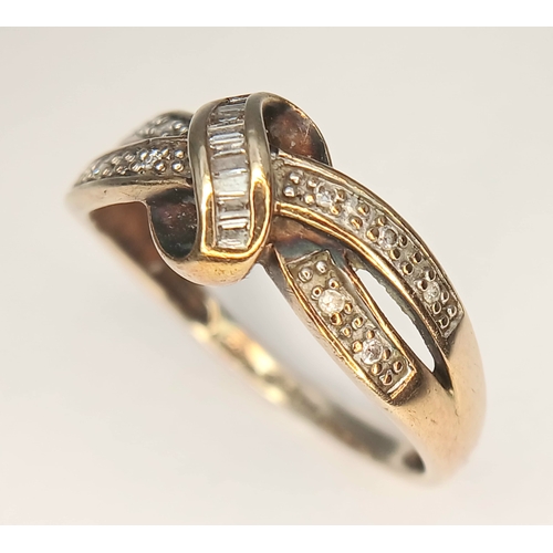 84 - Classic 9 CARAT GOLD ‘CROSSOVER’ RING set  with ROUND and BAGETTE CUT DIAMONDS. 2.6 Grams. Size P - ... 