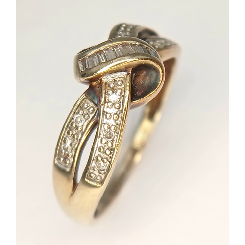 84 - Classic 9 CARAT GOLD ‘CROSSOVER’ RING set  with ROUND and BAGETTE CUT DIAMONDS. 2.6 Grams. Size P - ... 