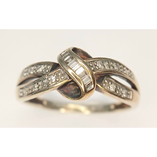 84 - Classic 9 CARAT GOLD ‘CROSSOVER’ RING set  with ROUND and BAGETTE CUT DIAMONDS. 2.6 Grams. Size P - ... 