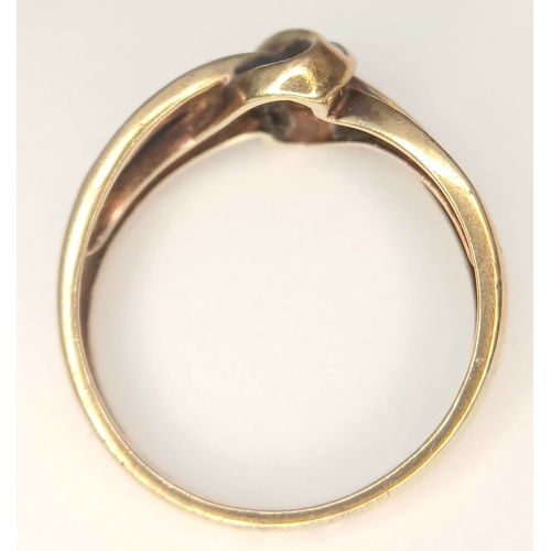 84 - Classic 9 CARAT GOLD ‘CROSSOVER’ RING set  with ROUND and BAGETTE CUT DIAMONDS. 2.6 Grams. Size P - ... 