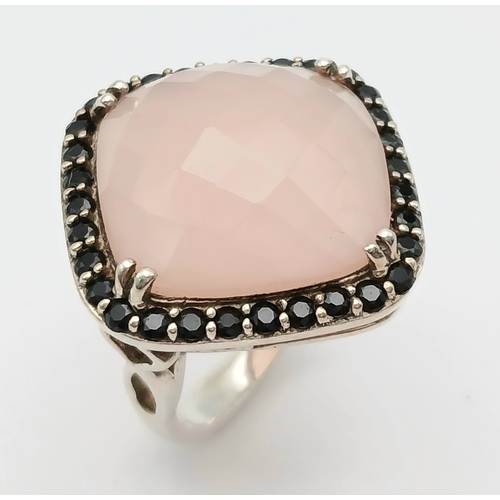 1041 - AN Impressive Sterling Silver Rose Quartz and Black Onyx Set Ring Size Q, measures 2.6cm Wide at the... 