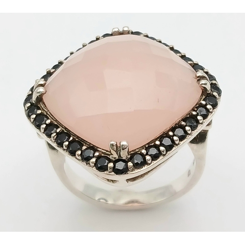 1041 - AN Impressive Sterling Silver Rose Quartz and Black Onyx Set Ring Size Q, measures 2.6cm Wide at the... 