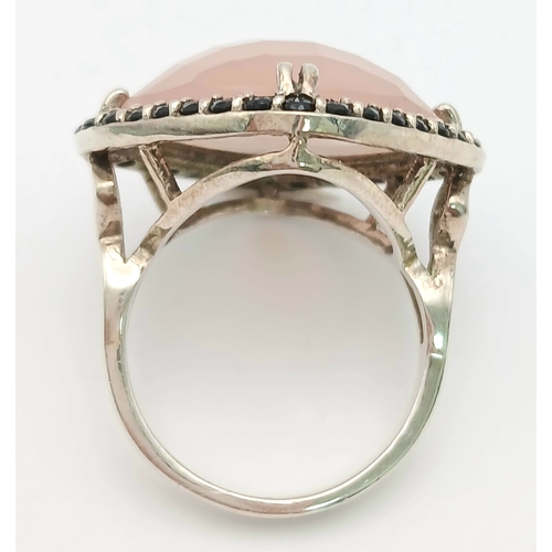 1041 - AN Impressive Sterling Silver Rose Quartz and Black Onyx Set Ring Size Q, measures 2.6cm Wide at the... 