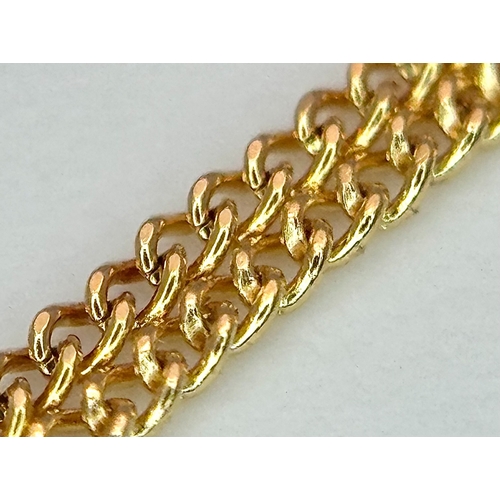 557 - A Stylish 9 Carat Gold Blue Topaz Set Pendant Necklace, 41cm Length Chain. Pendant measures 1.4cm Dr... 