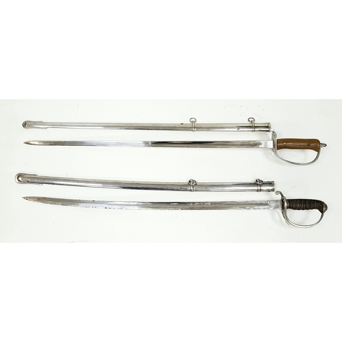 854 - Two Vintage British Army Swords with Metal Scabbards. Broad arrow (India) mark on shorter sword and ... 