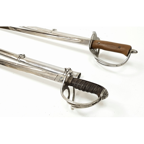 854 - Two Vintage British Army Swords with Metal Scabbards. Broad arrow (India) mark on shorter sword and ... 