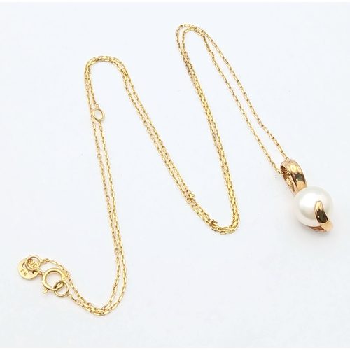 550 - An Elegant 9 Carat Gold and Cultured Pearl Necklace-46cm Length. The Pendant measures a 1.5cm Drop f... 