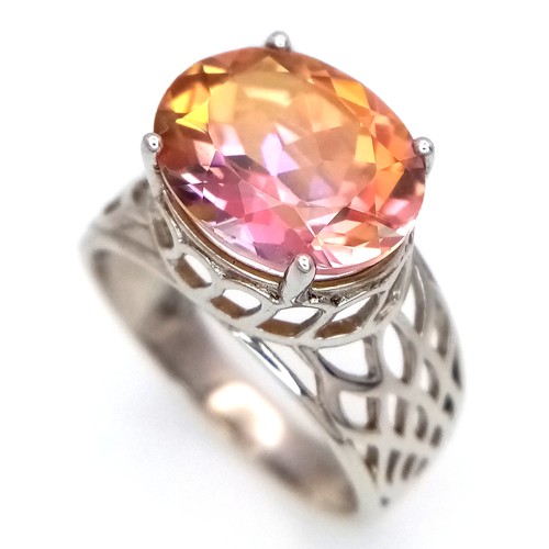 1014 - An Attractive Sterling Silver Twilight Fire Topaz Open Work Design Ring Size O, set with a 1.2cm Lon... 