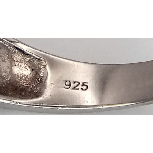 1014 - An Attractive Sterling Silver Twilight Fire Topaz Open Work Design Ring Size O, set with a 1.2cm Lon... 