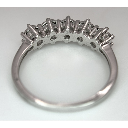 1012 - A 9K White Gold Five Stone Diamond Ring. Size O. 2.7g. NL16/11206.