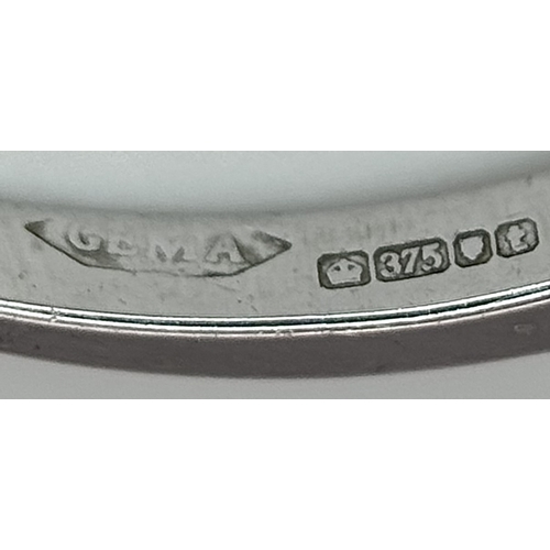 1012 - A 9K White Gold Five Stone Diamond Ring. Size O. 2.7g. NL16/11206.