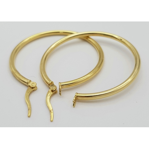 1019 - A Pair of 9K Yellow Gold Hoop Earrings. 3cm diameter. 1.3g.