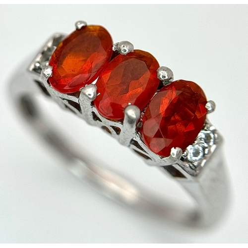 1009 - A Pretty Sterling Silver Fire Opal and White Sapphire Ring Size P1/2, set with Three 6mm Oval Cut Fi... 