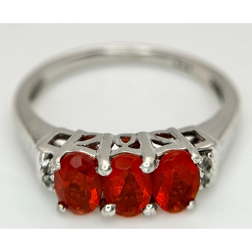 1009 - A Pretty Sterling Silver Fire Opal and White Sapphire Ring Size P1/2, set with Three 6mm Oval Cut Fi... 