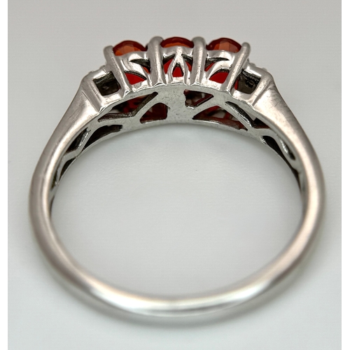 1009 - A Pretty Sterling Silver Fire Opal and White Sapphire Ring Size P1/2, set with Three 6mm Oval Cut Fi... 