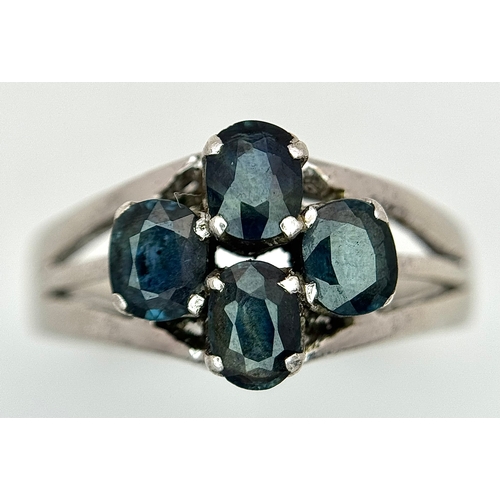 1016 - A Vintage Sterling Silver and Four Blue Sapphire Set Ring Size Q, set with four 5 x 4mm Oval Cut Sap... 