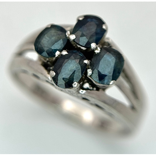 1016 - A Vintage Sterling Silver and Four Blue Sapphire Set Ring Size Q, set with four 5 x 4mm Oval Cut Sap... 