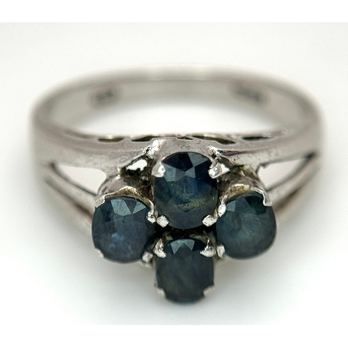 1016 - A Vintage Sterling Silver and Four Blue Sapphire Set Ring Size Q, set with four 5 x 4mm Oval Cut Sap... 