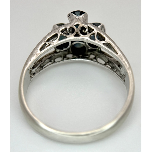 1016 - A Vintage Sterling Silver and Four Blue Sapphire Set Ring Size Q, set with four 5 x 4mm Oval Cut Sap... 