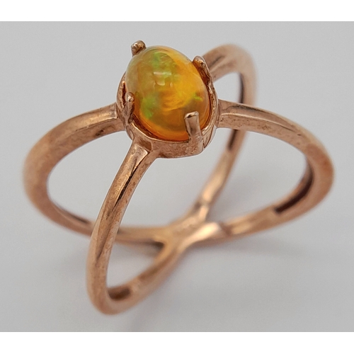 1017 - An eye catching 925 rose gold gilded silver Opal stylish ring. Total weight 2.7G. Size N