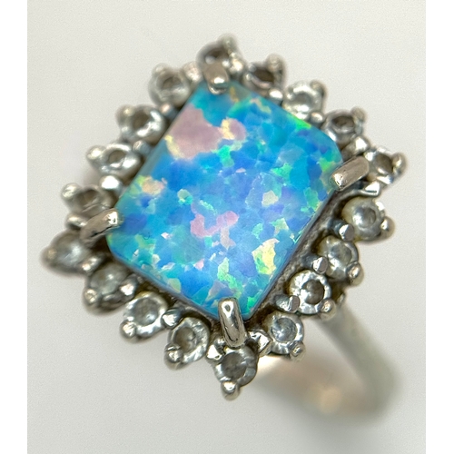 1023 - A Vintage Sterling Silver Opal and White Quartz Ring Size R, set with a 1cm Long Rectangle Cut Opal ... 