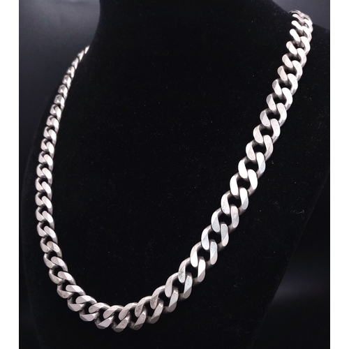 1024 - A 925 silver chunky curb link necklace. Total weight 64.6G. Total length 52cm.