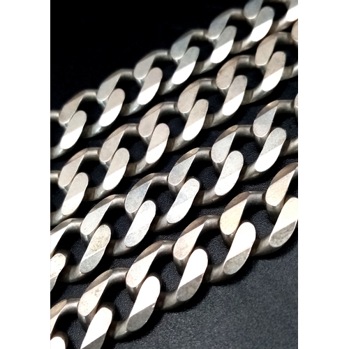 1024 - A 925 silver chunky curb link necklace. Total weight 64.6G. Total length 52cm.