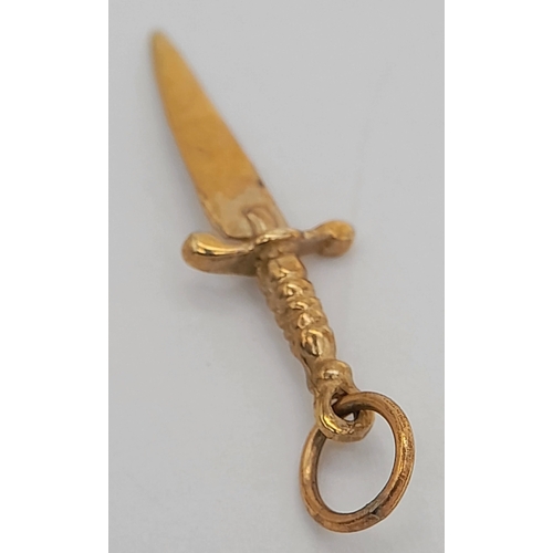 1053 - A 9K YELLOW GOLD, DAGGER CHARM / PENDANT. 0.4G. SC 4013