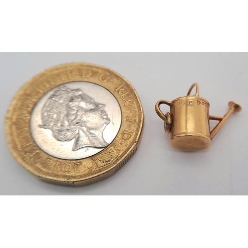 1060 - A 9K YELLOW GOLD, WATERING CAN CHARM / PENDANT. 0.7G. SC 4017