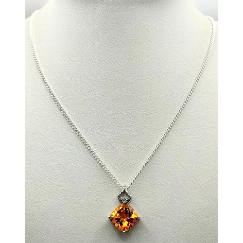 1021 - A Striking Sterling Silver Citrine and White Topaz Pendant Necklace, 46cm Length Chain. Pendant meas... 