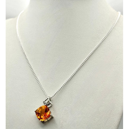 1021 - A Striking Sterling Silver Citrine and White Topaz Pendant Necklace, 46cm Length Chain. Pendant meas... 