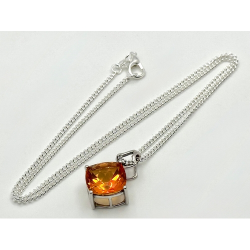 1021 - A Striking Sterling Silver Citrine and White Topaz Pendant Necklace, 46cm Length Chain. Pendant meas... 