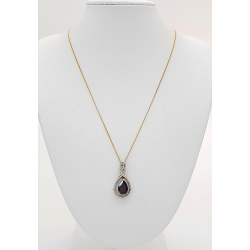 1040 - A 925 gilded silver Garnet and stone set pendant, set on a gilded silver necklace. Total weight 3.3G... 