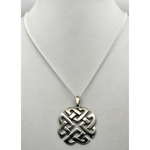 1042 - A Vintage Sterling Silver Celtic Knot Pendant on 46cm Sterling Silver Chain. Pendant measures 3cm Wi... 