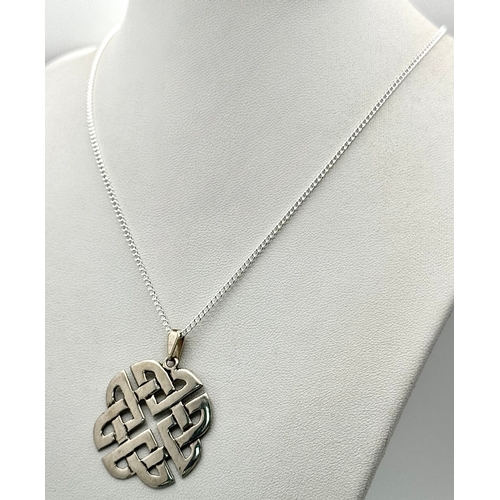 1042 - A Vintage Sterling Silver Celtic Knot Pendant on 46cm Sterling Silver Chain. Pendant measures 3cm Wi... 