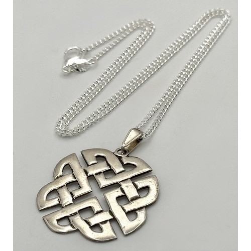 1042 - A Vintage Sterling Silver Celtic Knot Pendant on 46cm Sterling Silver Chain. Pendant measures 3cm Wi... 