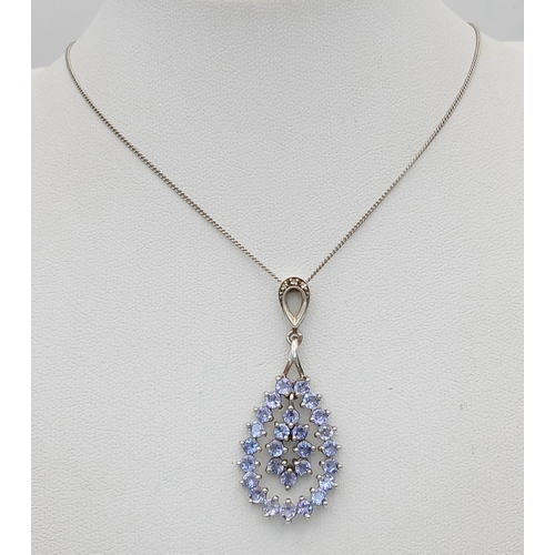 1047 - A stunning 925 silver Topaz pendant, set on a silver delicate Necklace. Total weight 4.1G. Total len... 