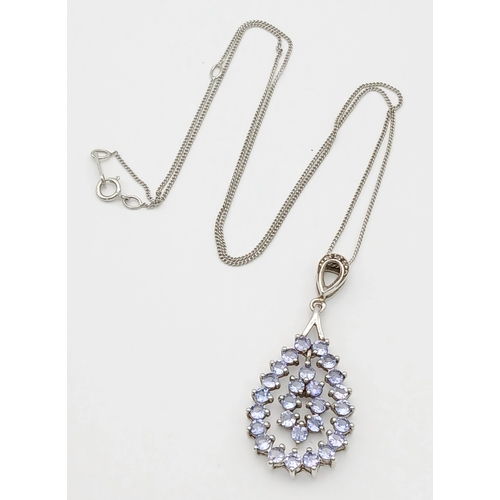 1047 - A stunning 925 silver Topaz pendant, set on a silver delicate Necklace. Total weight 4.1G. Total len... 