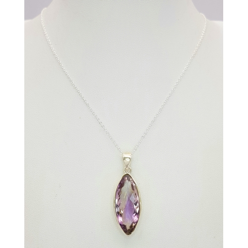 101 - An Amethyst 25 Silver Pendant. Faceted marquise shape. Comes with a thin silver chain. 4cm pendant. ... 