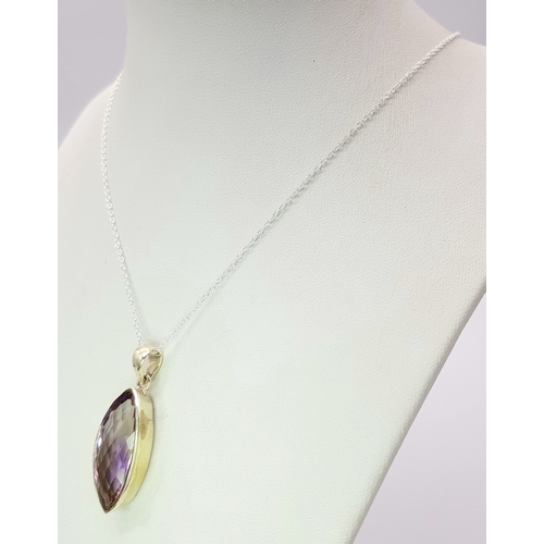 101 - An Amethyst 25 Silver Pendant. Faceted marquise shape. Comes with a thin silver chain. 4cm pendant. ... 