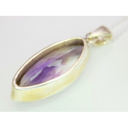 101 - An Amethyst 25 Silver Pendant. Faceted marquise shape. Comes with a thin silver chain. 4cm pendant. ... 