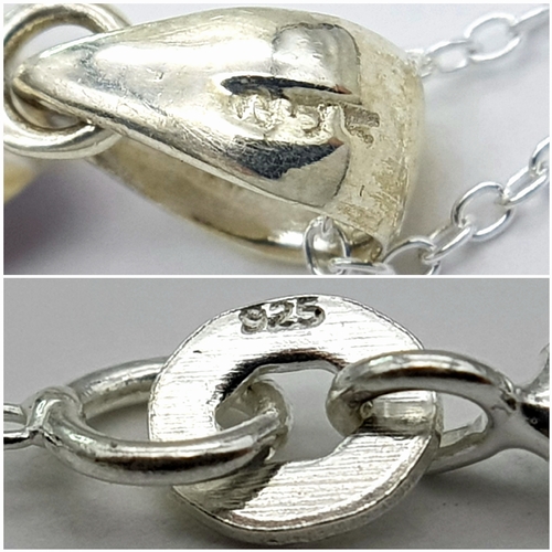 101 - An Amethyst 25 Silver Pendant. Faceted marquise shape. Comes with a thin silver chain. 4cm pendant. ... 
