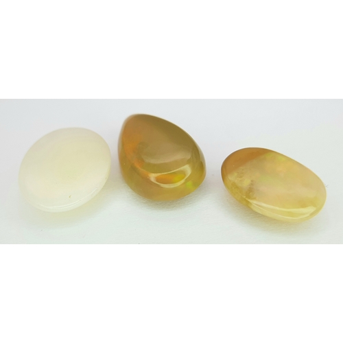 129 - A 6ctw White Fire Opal Gemstone Lot of 3 Pieces. Mixed Shapes. No certificate so as found. VC107.