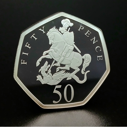 1065 - A Harrington and Byrne Commemorative Fine Silver (.999 purity) Proof 50p Coin. 15.56g. Comes with ca... 