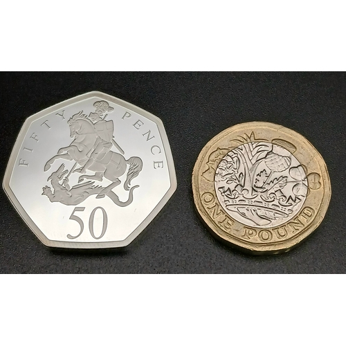 1065 - A Harrington and Byrne Commemorative Fine Silver (.999 purity) Proof 50p Coin. 15.56g. Comes with ca... 