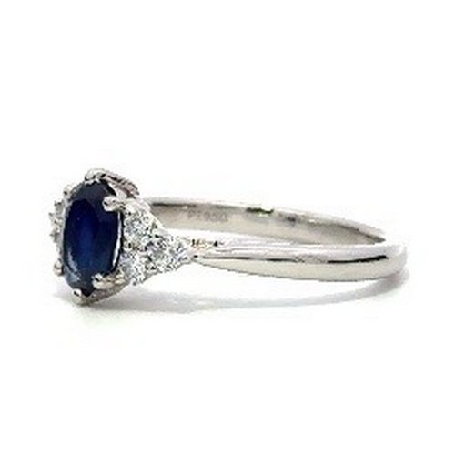97 - A Platinum natural Blue Sapphire and Diamond Ring. Blue sapphire - 0.98ct. Diamond - 0.26ct. Size M.... 