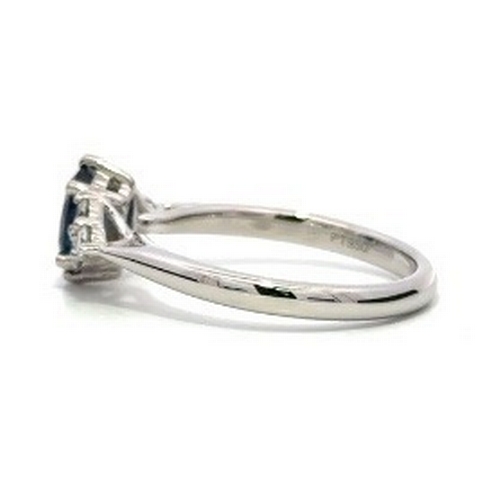 97 - A Platinum natural Blue Sapphire and Diamond Ring. Blue sapphire - 0.98ct. Diamond - 0.26ct. Size M.... 